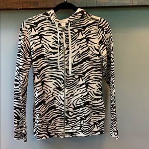 Lucy size M zip up Hoodie.  Never worn, no tags.